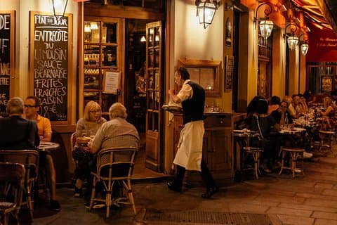 Experience Paris by night with a local private guide