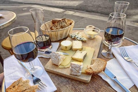 Enjoy a late evening degustation of select wine & cheeses at the culmination of your walking tour!