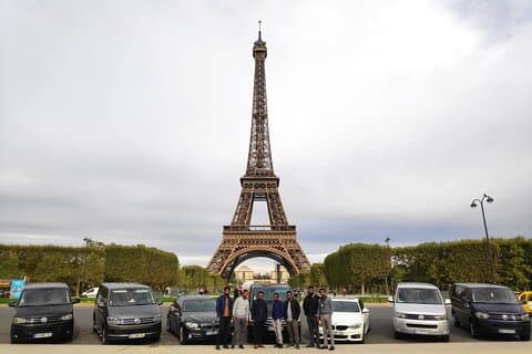 Our driver team and vehicles in Eiffel Tower while waiting our guests