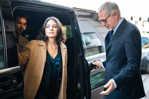 Premium Experience: Our professional driver welcomes you with elegance and attention.