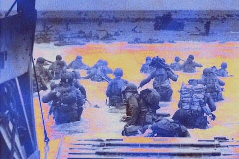 Soldiers and officers of the "Big Red One" (the American 1st Infantry Division) landing on Omaha Beach, in the early hours of D-Day, June 6 1944.