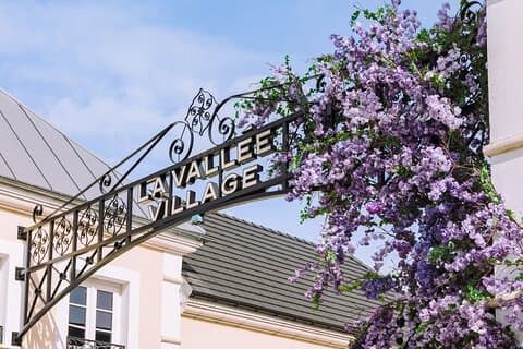 Shopping Tour to La Vallée Village Outlet in a Private Car or VAN
