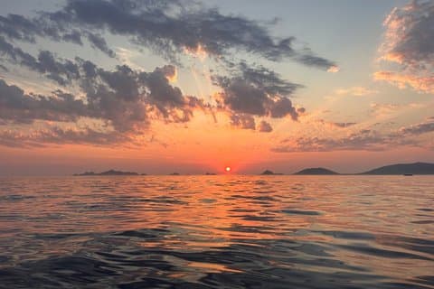 Sunset boat cruise with Aperitif at the Sanguinary Islands