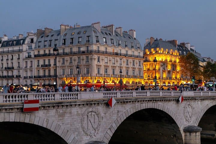 Experience Paris by night with a local private guide