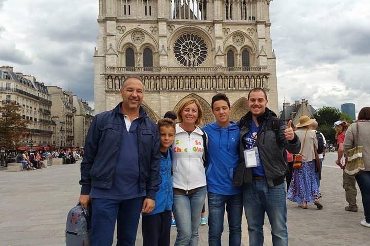 One of our guides in front of Notre Dame Cathedral