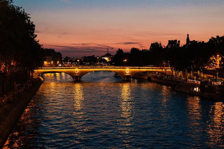 Experience Paris by night with a local private guide