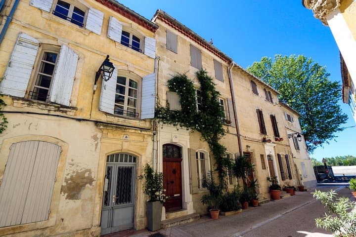 Traditional narrow streets and historic building lead from the river Rhône