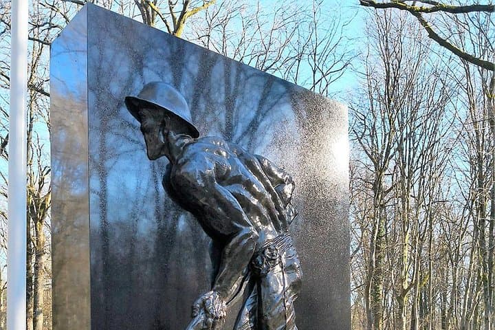 Belleau Wood - In the center of the road leading through the woods is a flagpole and a monument commemorating the valor of the U.S. Marines who captured this area in 1918.