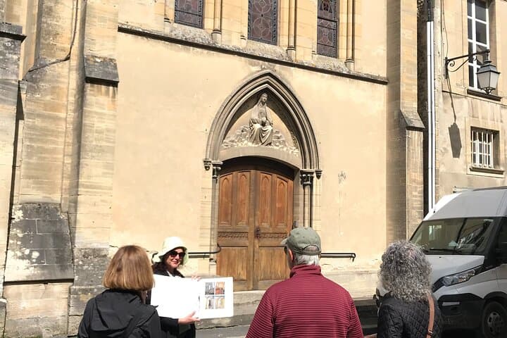 Christèle explaining the history of the Chapel rue du General de Dais during a private Bayeux City Tour