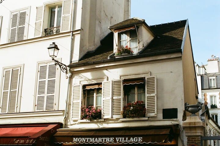 6 Hrs Montmartre and la Vallée Village private shopping trip with Hotel pick up