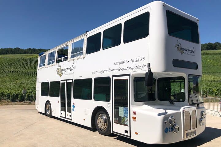 The double-decker bus invites you
