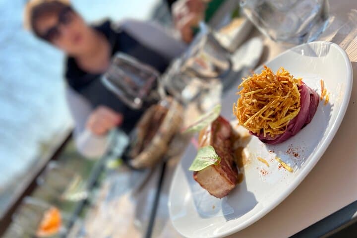 Eat a delicious lunch in the famous restaurant at Maison Fournaise - over looking the beautiful Seine river.