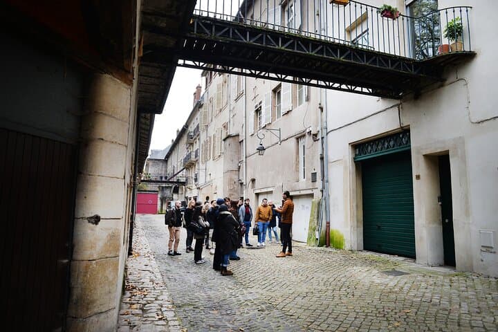 Picturesque alley with charming footbridges spanning the old stables.