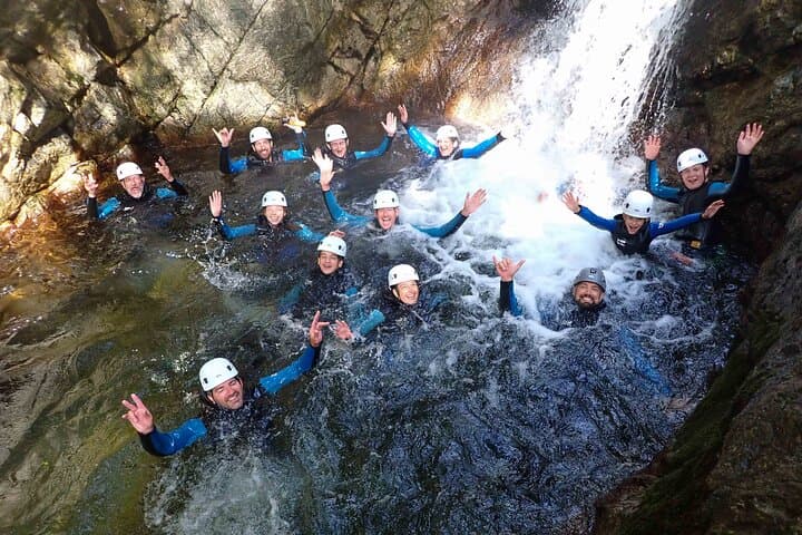 group photo in a waterfall in Ardèche