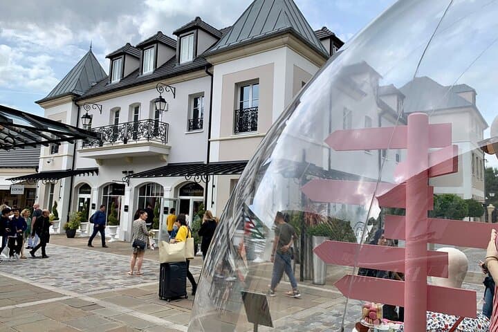 Half day private round transfer to La Vallée Village from Paris