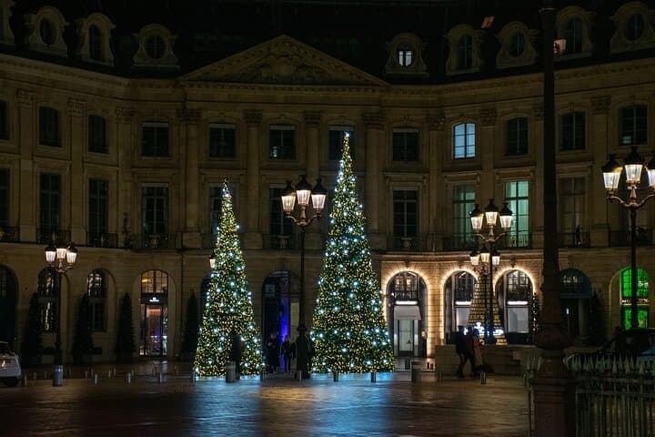 Illuminated christmas trees at night on a square