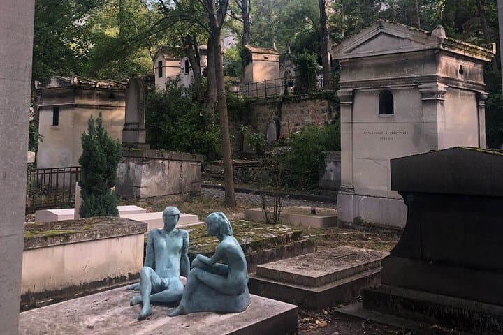 In memory of an unknown couple in 'full Monte' at Père Lachaise Cemetery
