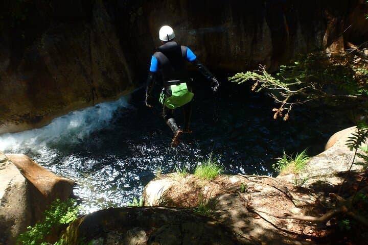 7m jump (optional) while canyoning in the Pyrenees.