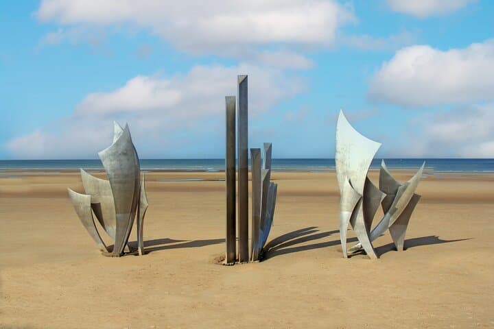Visit Omaha Beach and Utah Beach.