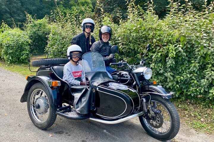 Saint Malo and Saint Servan in vintage sidecar with driver