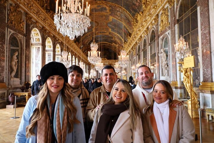 Marvel at the breathtaking Hall of Mirrors, where light dances through countless crystal chandeliers, reflecting centuries of history and elegance.