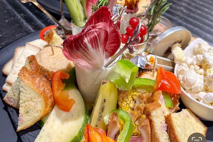Immersive cellar tour, tasting and board meal