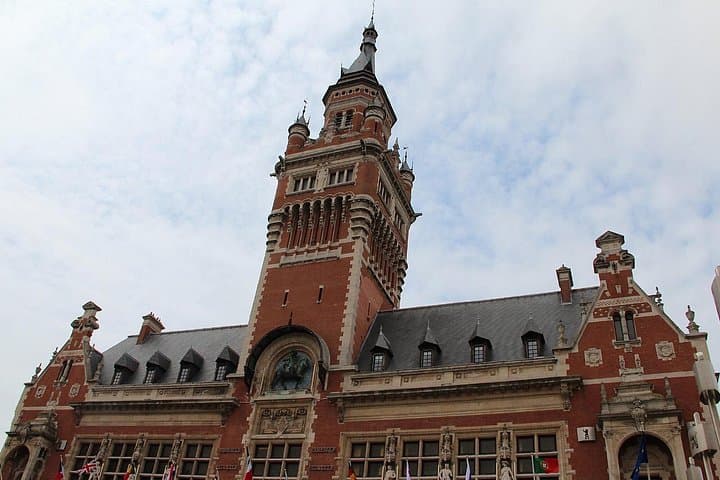 City Inn: The Flemish Revival jewel and its UNESCO World Heritage belfry.