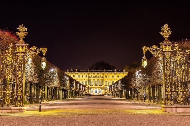 Stanislas Square (UNESCO): Jean Lamour’s famous golden gates lit up at night.