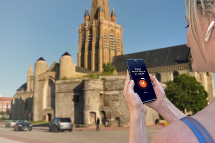 Visit of Calais in freedom: In front of Notre-Dame Church, famous for its unique Tudor architecture in France.