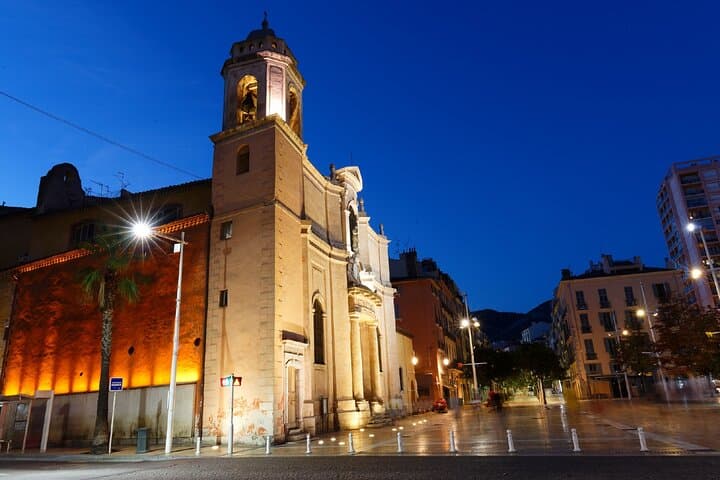 Saint-François-de-Paule Church: The charm of Provencal baroque heritage illuminated in the evening.
