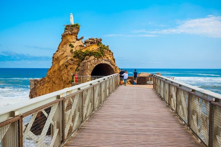 Rocher de la Vierge: The emblem of the city, connected to the coast by a footbridge attributed to Eiffel.