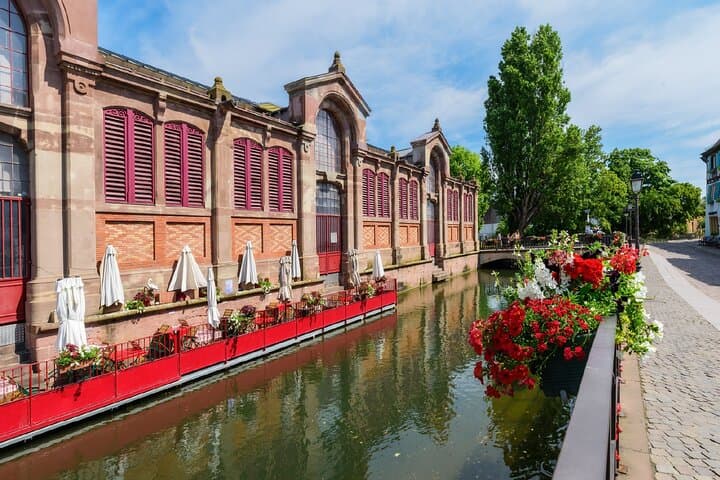The Covered Point of Sale: The brick and sandstone architecture of this historic Point of Sale, bordered by the Lauch Canal.