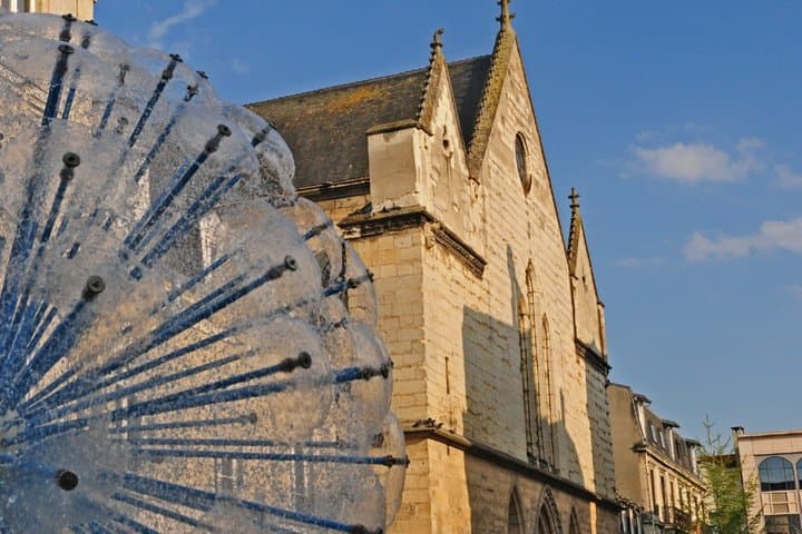Notre-Dame Cathedral: The majesty of the Gothic and its flying buttresses, the crowning place of 33 kings of France, neighbouring modernity.