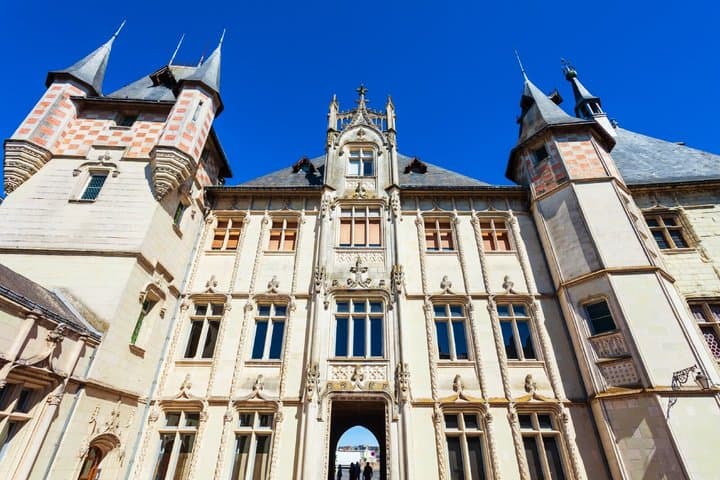 Inn: The magnificent fortified façade mixing flamboyant Gothic and Renaissance styles, former bastion on the Loire.