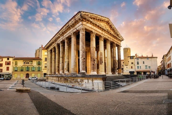 Temple of Augustus and Livia: The majestic jewel of the Roman era, miraculously preserved in the heart of the city center.