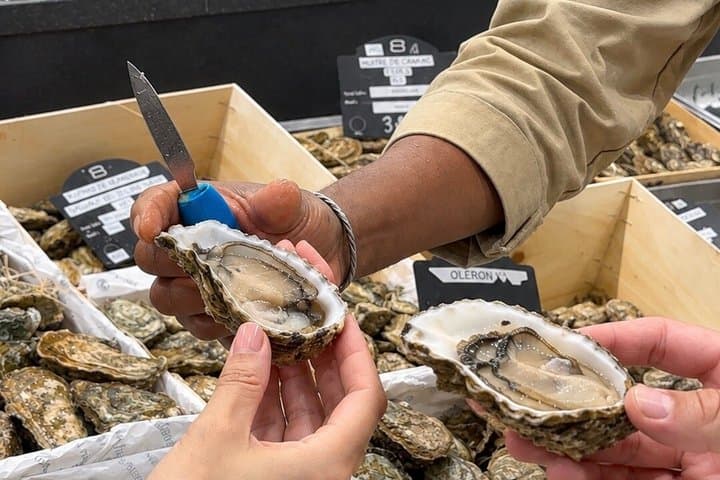 Iconic Eiffel Tower Food Tour: Oysters, Cheese, Wine & More