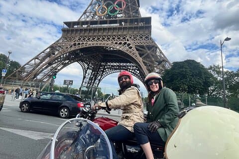 Cruising past the Eiffel Tower on a sidecar tour!