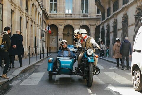 Side-car ride in sunny street.