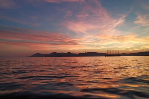 Aperitif on the island in vintage sailboat