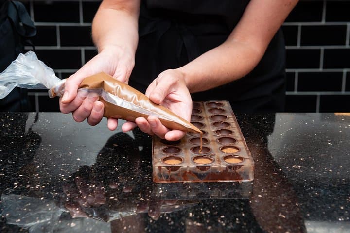 Piping your chocolates by hand