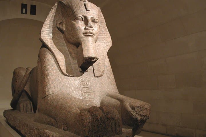 Louvre museum with small group