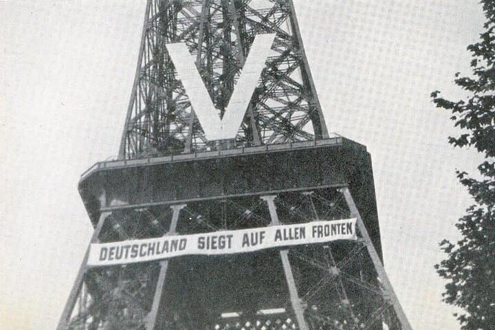 The Germans were quick to remind Parisians of just who had won the war! The sign reads "Germany is victorious on every front" Parisians were constantly bombarded for 4 years with Nazi propaganda!