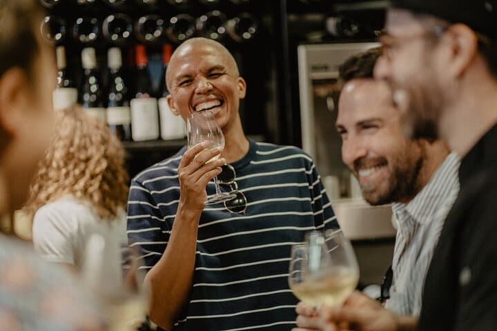 Enjoying a local white wine during our tour.