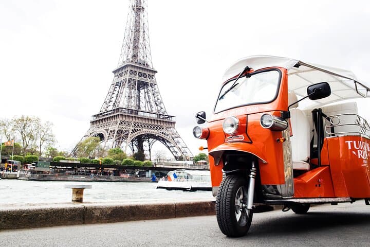 OUR TUKTUK HAS THE EIFFEL TOWER