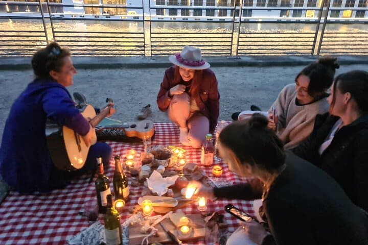 Our local musician telling the history of french chanson while you dine riverside.
