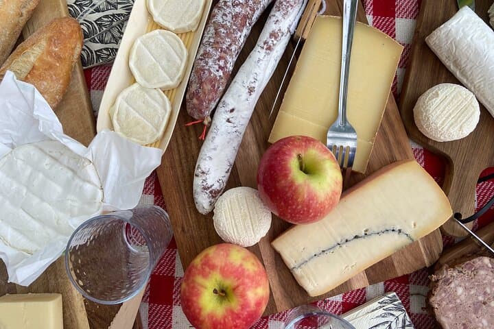 French Apéritif: a "pre-dinner" snack and drink marking the transition from the day to the evening. (Often turning into an aperitif dinatoire - where you have enough cheese to constitute a meal)