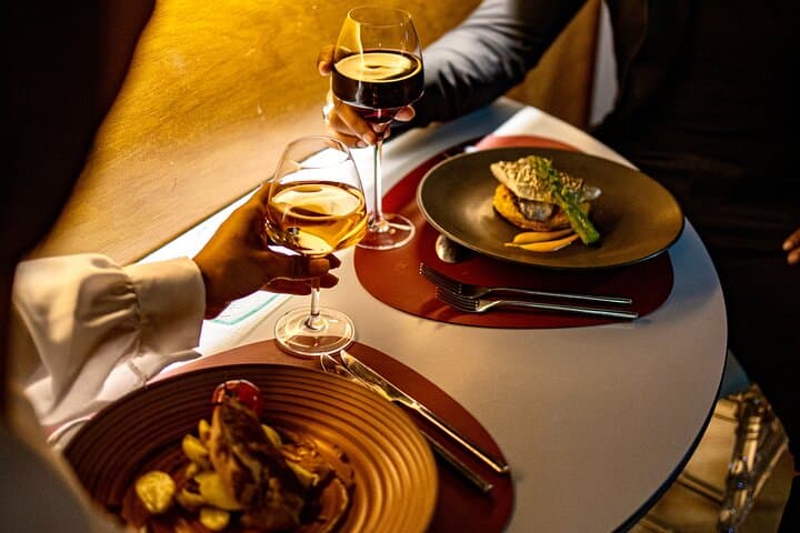 Gourmet dinner on board — 3-course meal with wine and Eiffel Tower views.
