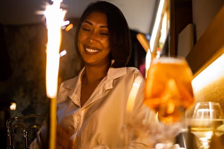 A sparkling moment on board — joy and celebration by the Seine.