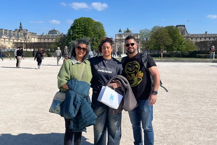 Our first tour in Paris. A Family from London, England next to the site of the Tuileries Palace.
