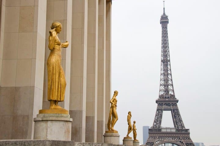 Paris Eiffel Tower District Tour and Seine River Cruise